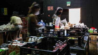 Volunteers at a food bank in Madrid, Spain supporting people impacted by the Covid-19 pandemic.