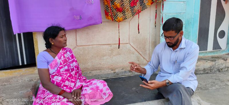 Person in India being interviewed by Gallup
